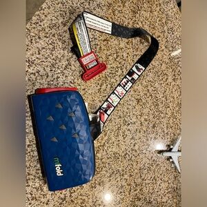 Mifold travel carseat